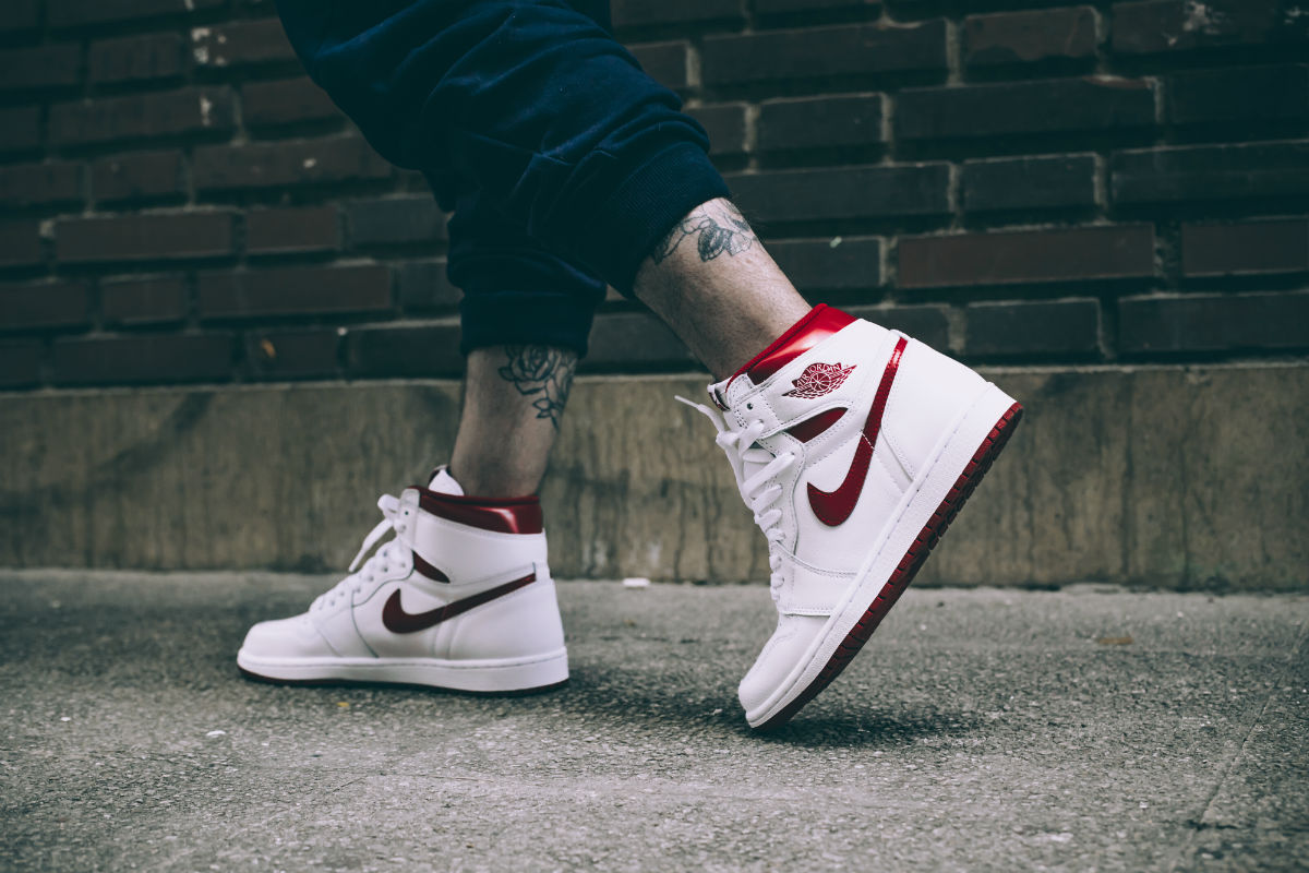 metallic red jordan 1 on feet